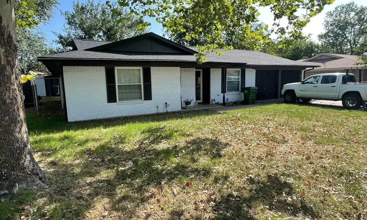 Professional roofing crew working on a residential roof in Eastvale